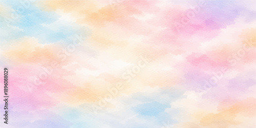 A beautiful summer day features a bright sun shining through a clear blue sky filled with soft white clouds creating a peaceful nature atmosphere