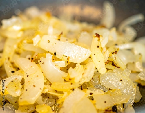 Sliced onions sauteing in a pan (1)