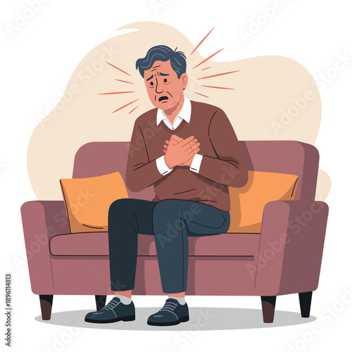 Elderly man clutching his chest while sitting on a sofa indicates severe sudden heart attack pain.
