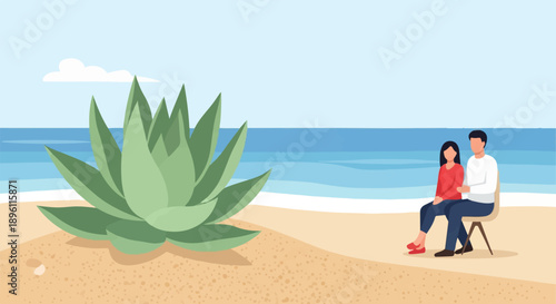 Couple sits on a beach next to a succulent plant with ocean in background