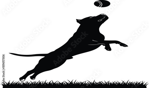 Dynamic black silhouette of energetic pit bull dog leaping high in air to catch flying tennis ball on grassy field symbolizing playfulness energy strength agility loyalty fun and active pet lifestyle