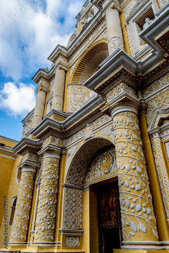 Historic La Merced church and convent glowing in warm sunlight in the colonial city of Antigua