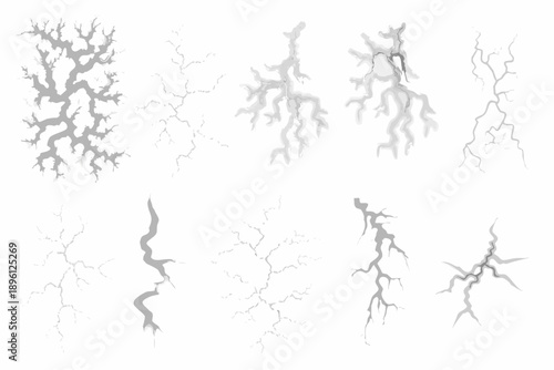 Collection of gray lightning bolt shapes and crack patterns on white