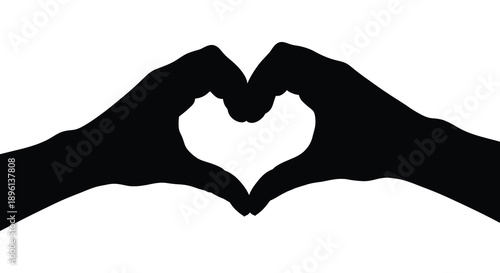 Two hands forming a heart shape with negative space a striking silhouette