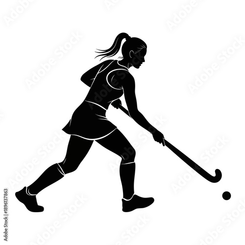 Silhouette of a female field hockey player in action, dribbling ball with stick