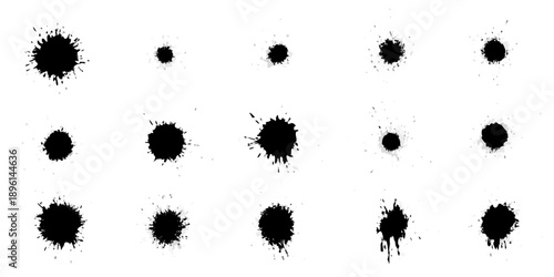 Abstract arrangement of irregular dark blotches on a white background