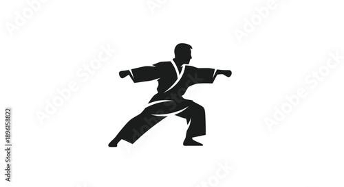 Karate fighter in stance, black silhouette