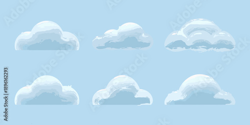Collection of fluffy white clouds against a pale blue sky