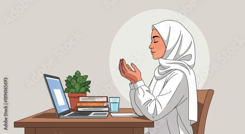Muslim woman praying at desk with laptop, books, and plant