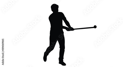 Silhouette of a baseball player swinging a bat during a game