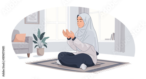 Muslim woman praying at home, wearing hijab, seated on prayer mat