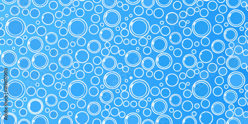 Abstract background featuring overlapping white circles on a bright blue field