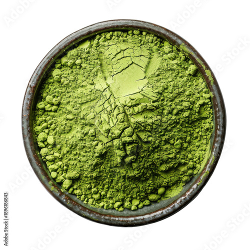 Finely ground matcha powder in a rustic ceramic bowl, overhead view isolated on white background