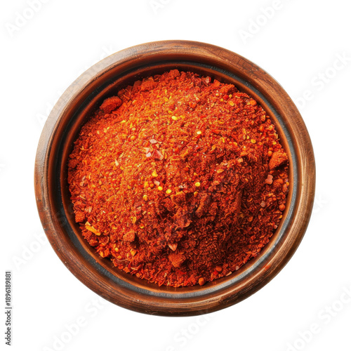 Aromatic red chili spice blend in a rustic bowl isolated on white background