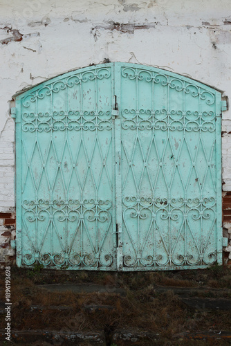 Wallpaper Mural There are iron gates on the facade of an old merchant's shop Torontodigital.ca