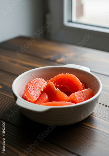 Vertical healthy breakfast featuring grapefruit segments prepared for breakfast close up view — Close Up