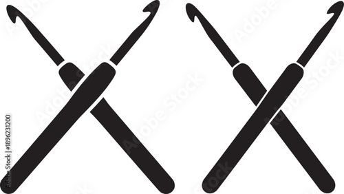 Two black crochet hooks crossed, symbolizing knitting, crafting, hobbies, and needlework. Ideal for DIY and craft content.