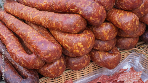 Various smoked sausages at traditional food fair