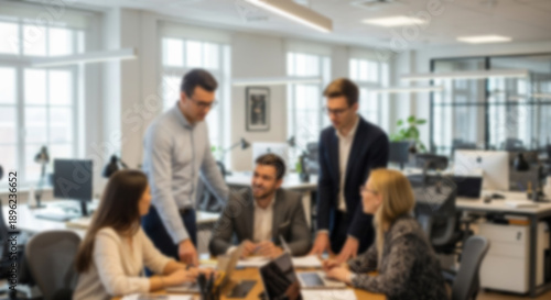 Blurred professional team meeting in modern office with soft focus effect