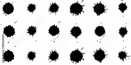 Abstract arrangement of irregular black ink blots on a white background