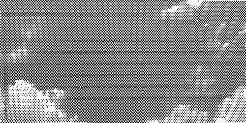 A grainy black and white image depicting a face with indistinct features