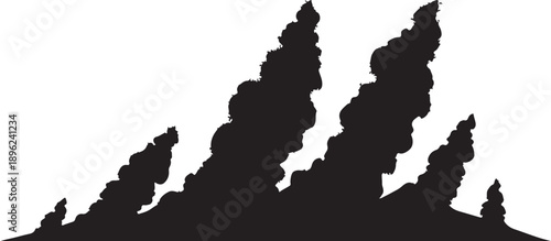 Black smoke rising from a hill or mountain top