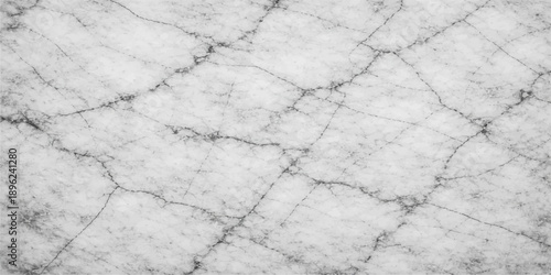 A closeup of a rough gray stone wall with a cracked marble texture and a weathered grunge pattern of ice and snow on its cold surface