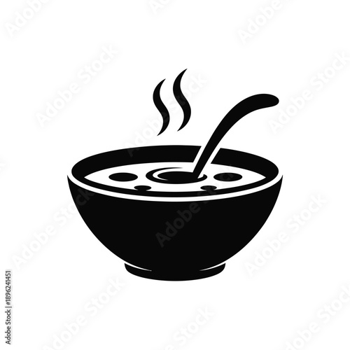 Silhouette of a person with arms raised standing on a hilltop