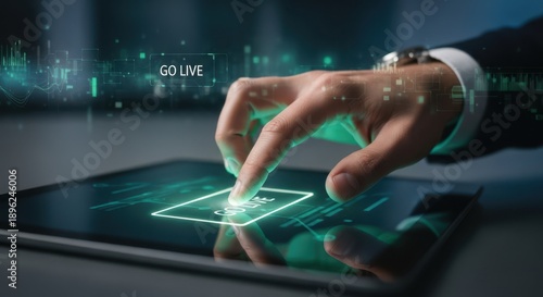 Closeup Businessman Hand touching Go Live button, representing broadcasting, launching product, real time event, and streaming technology.
