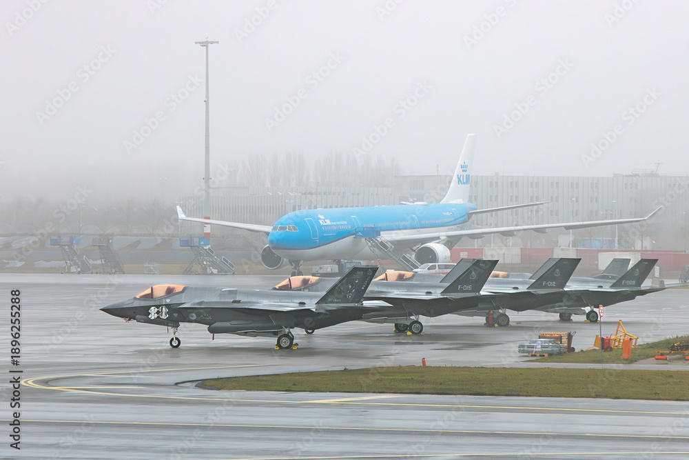 Fototapeta premium Dutch F-35 fighter jets on apron at Amsterdam Airport Schiphol