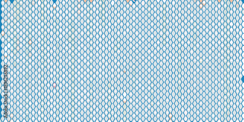 A close up view of a light blue surface with a repeating circular pattern
