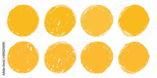 A collection of roughly drawn textured golden yellow oval shapes arranged on white