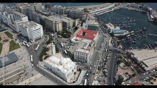 Aerial view of Martyrs Square mosque and fishing port in Algiers