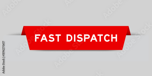 Red color inserted label with word fast dispatch on gray background