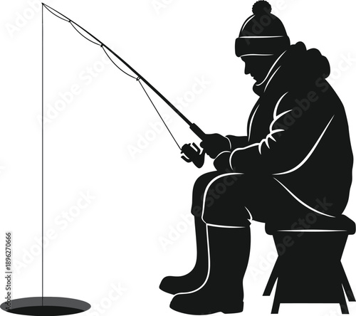 Silhouette of a bundled fisherman sitting on a stool actively ice fishing through a circular hole in the frozen water.