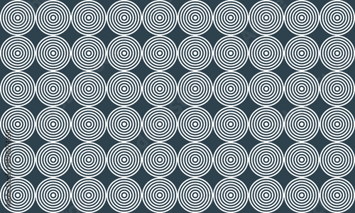 Abstract seamless pattern featuring white concentric circles on a dark blue background