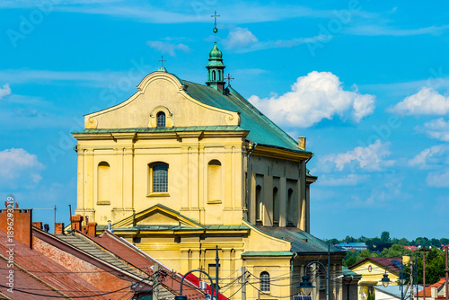Aerial view of XVII century Birth of Blessed Virgin Mary parish church in historic quarter of Sedziszow Malopolski town in Podkarpacie region of Lesser Poland