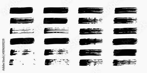Abstract collection of black brush strokes arranged in a grid pattern