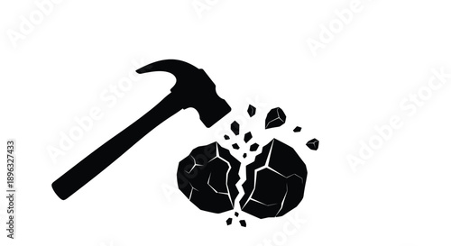 A hammer striking a rock causing it to shatter into fragments