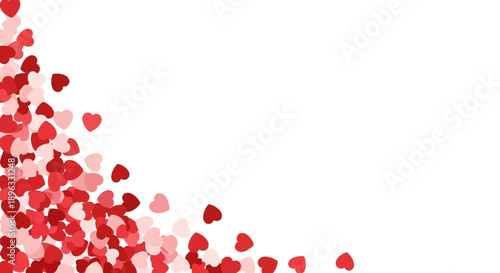 Red and pink heart confetti spilling down against a white background
