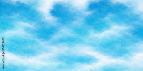 A beautiful clear blue sky background filled with bright white fluffy clouds and sunny summer light creates a peaceful nature cloudscape on a bright day