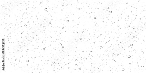 Abstract grunge texture featuring black and white raindrops on a transparent glass surface with clear wet liquid droplets and blue condensation patterns