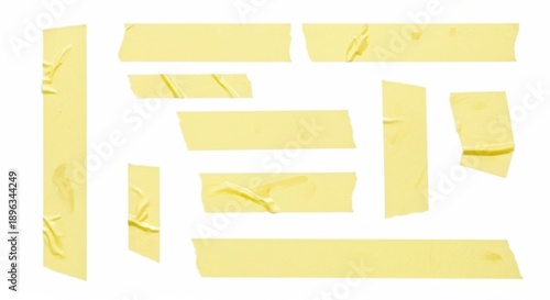 Set of various yellow sticky tape pieces isolated on white background