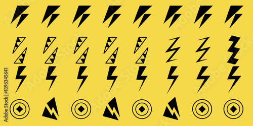 Abstract pattern of black lightning bolts and geometric shapes on yellow