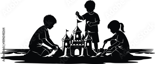 Children building a sandcastle together on a sunny day