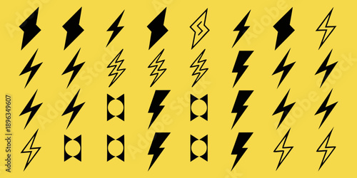 Collection of black lightning bolt and diamond shaped icons on yellow