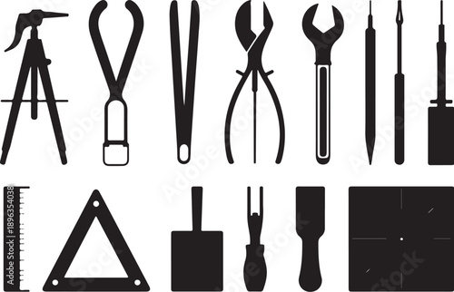 Black and white outline of various tools and measuring devices