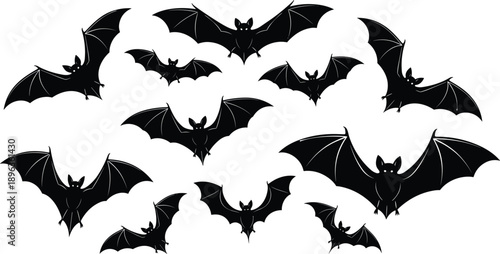 Flying bat silhouettes collection with spread wings isolated on white background for Halloween, spooky decoration, wildlife, and gothic design concepts