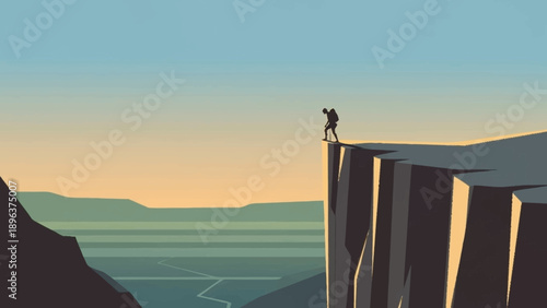 Lone hiker stands on the edge of a steep cliff overlooking a valley.