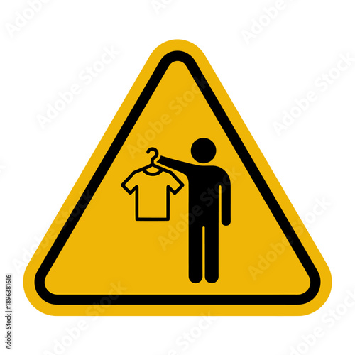 Yellow triangle warning sign with a man holding a tshirt on a hanger